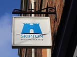 Former boss of Britain's biggest estate agency wins unfair dismissal and age discrimination case against Skipton