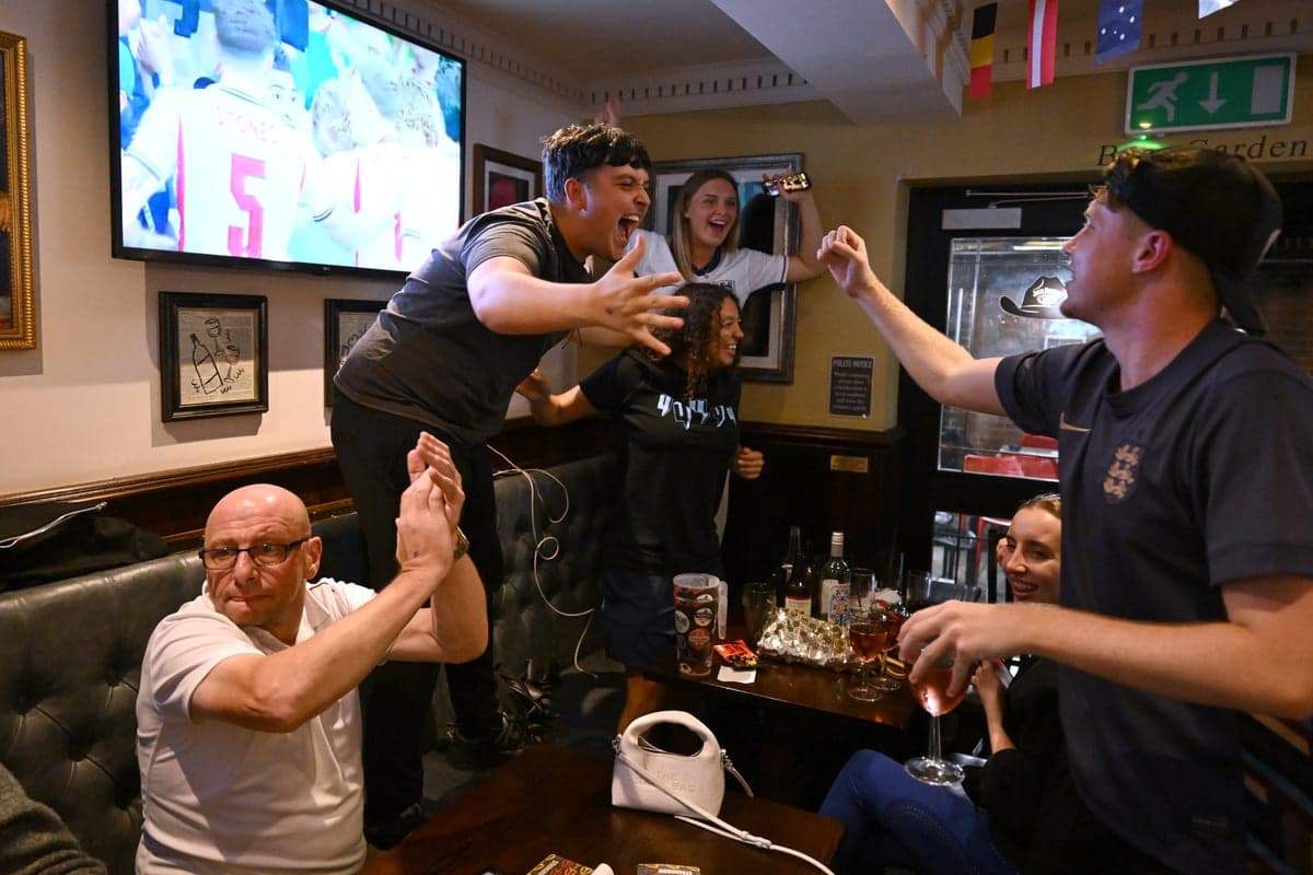 England fans celebrate as pubs set to stay open longer for Norway clash