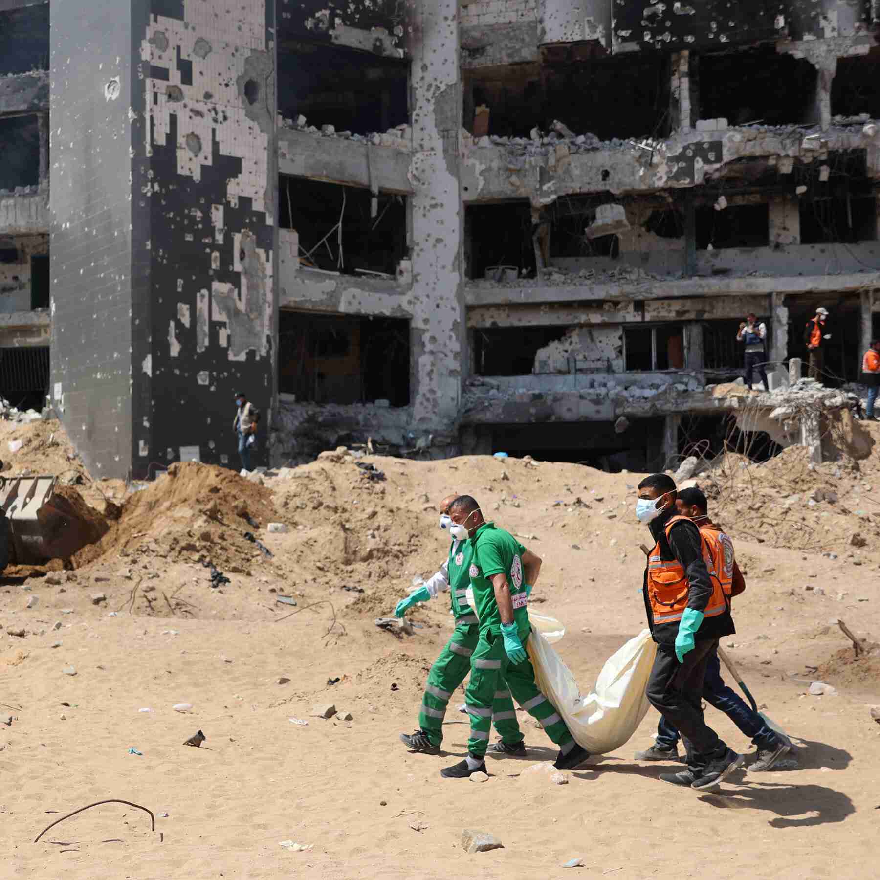 Middle East Crisis: Grim Task After Gaza Hospital Battle: Collecting Human Remains