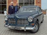 Couple in their seventies trade in their beloved 60-year-old classic Volvo for an electric car from the Swedish brand