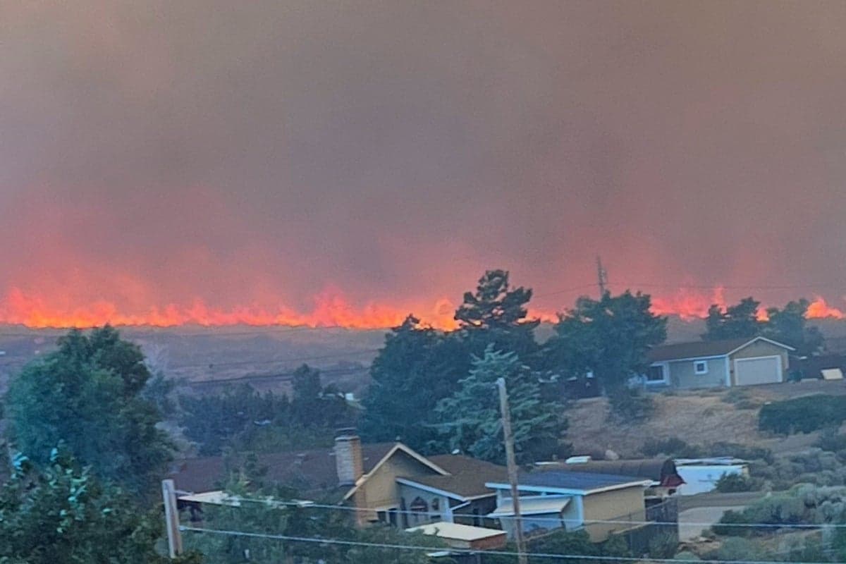 Wildfire approaches Reno, Nevada, forcing thousands to evacuate their neighborhoods