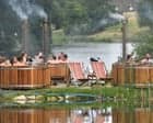Hot tubs and £80 rosé: how the mud-soaked British festival got a luxury makeover