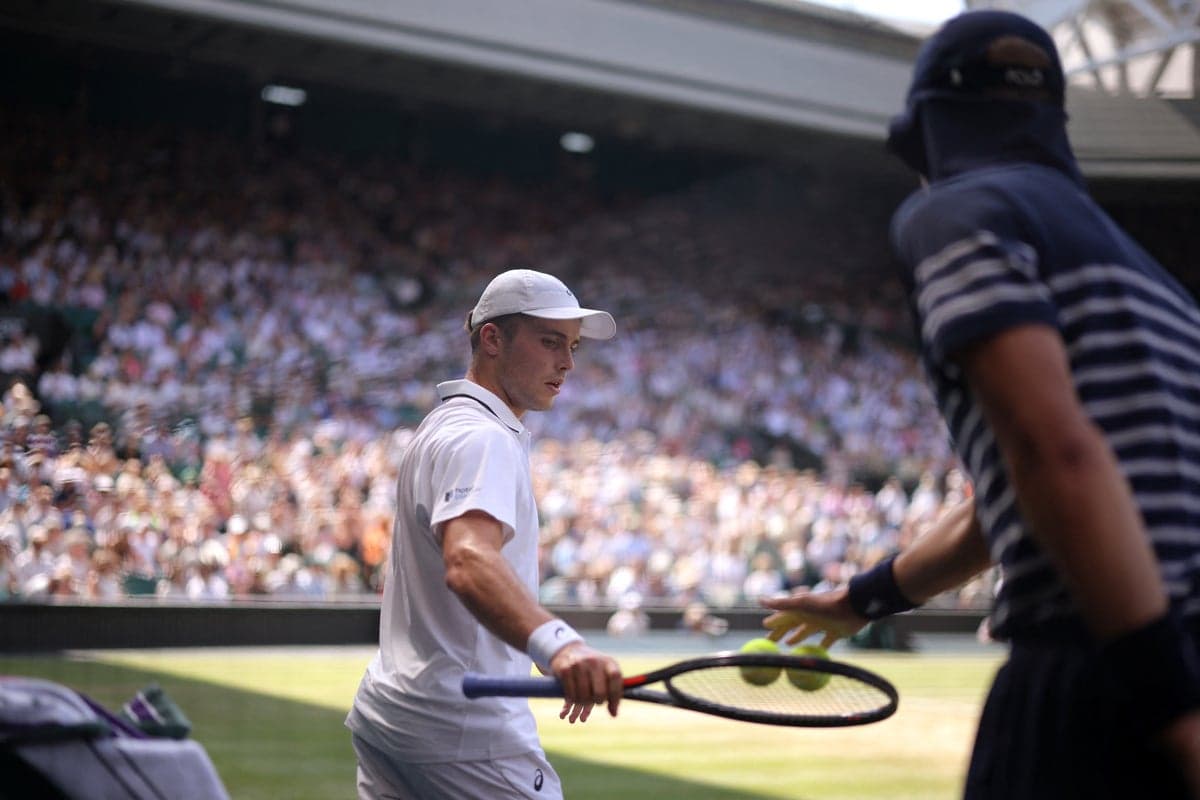 Wimbledon umpire tells off crowd as champagne corks disrupt Arthur Fery and Flavio Cobolli