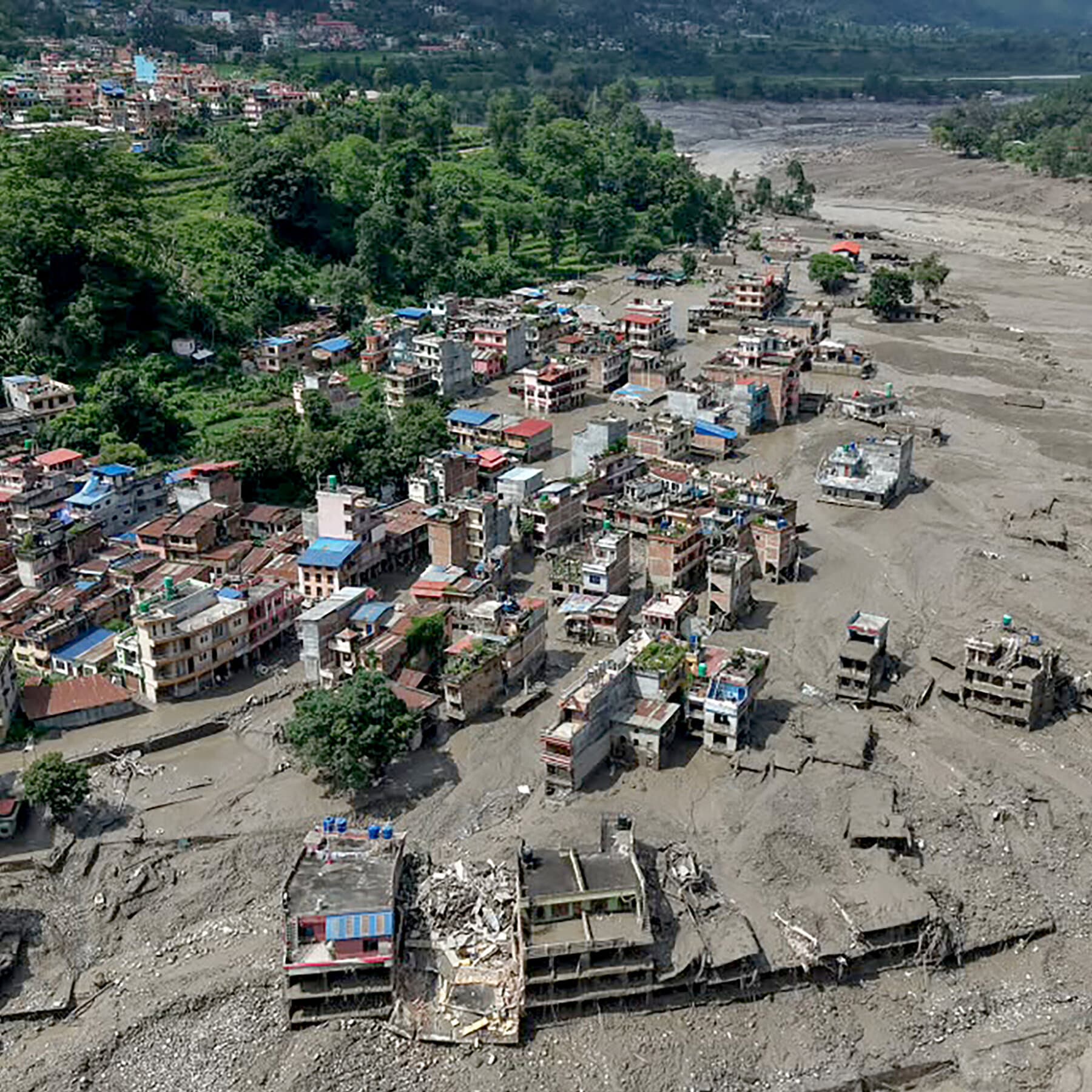 Photos: A Deadly Flood Tears Through Nepal and Tibet