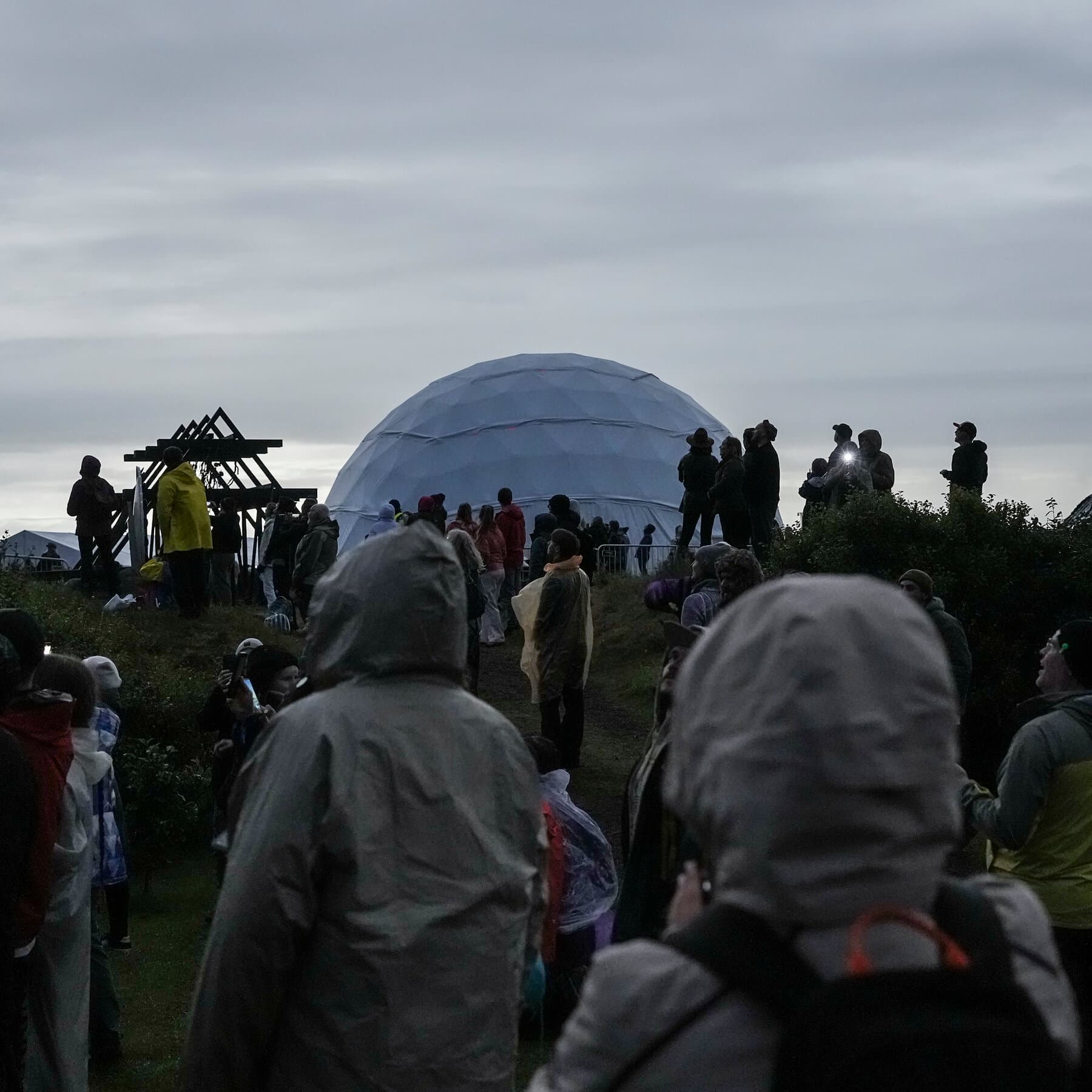Muddling through Iceland’s rainy eclipse, accompanied by clouds, whales and at least one proposal.