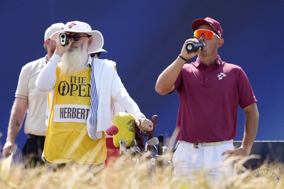 Open leader Lucas Herbert caught up in rangefinder controversy