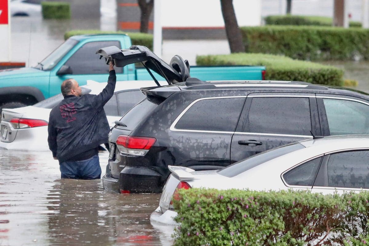 At least 16 dead in flooding and tornadoes as storms lash from Texas to Ohio