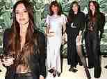 Victoria Beckham gives a glimpse at her midriff in chic trouser suit as she's joined by Helena Christensen and Katie Holmes at launch of designer's £23,750 Breitling watch collection