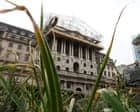 Bank of England expected to leave interest rates on hold today; UK unemployment falls – business live