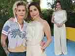 Sophia Bush looks glam in an ivory blouse as she cozies up to girlfriend Ashlyn Harris at Cannes Lions event
