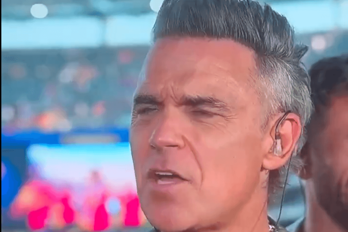 Robbie Williams addresses World Cup final TV incident after white object falls from mouth