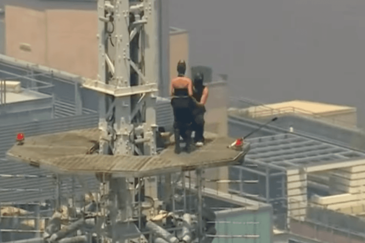 Watch: Masked Empire State Building pair appear to get engaged after scaling 1,454ft skyscraper