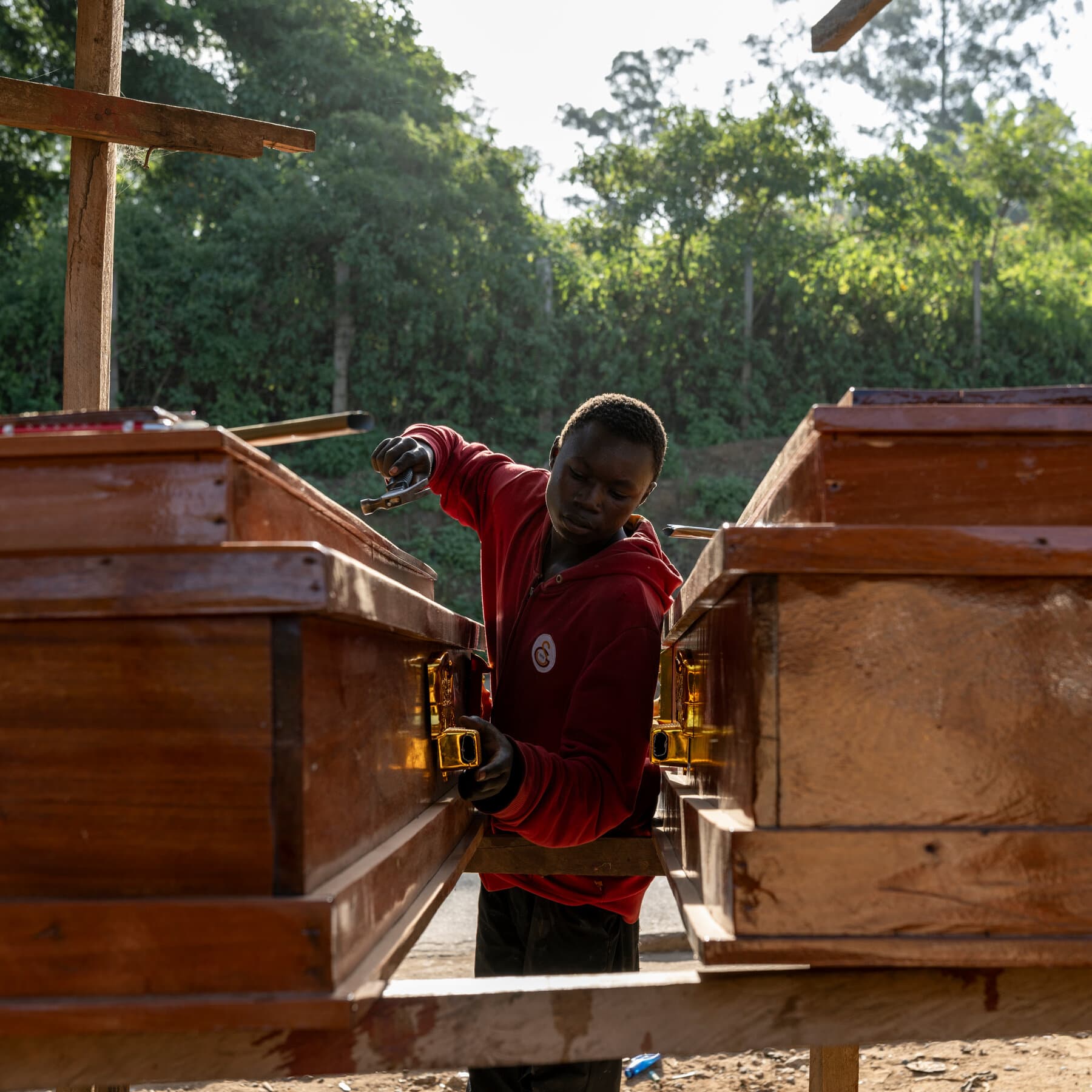 The Ritual of Coffin Making in a City Hit by Ebola