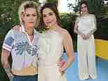 Sophia Bush looks glam in an ivory blouse as she cozies up to girlfriend Ashlyn Harris at Cannes Lions event
