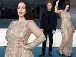 Rosalia puts on an ethereal display in a sheer pale gold dress as she joins her The Bear star boyfriend Jeremy Allen White at Louis Vuitton’s star-studded Prelude To The Olympics party