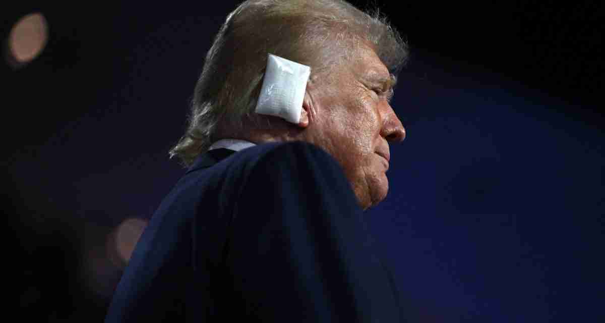 Trump appears emotional as he enters Republican convention with bandaged ear