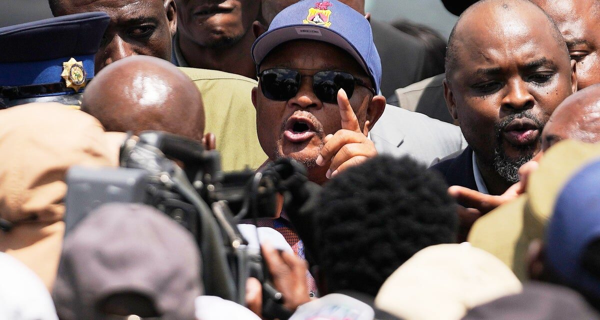 South African president suspends police minister accused of colluding with criminal syndicates