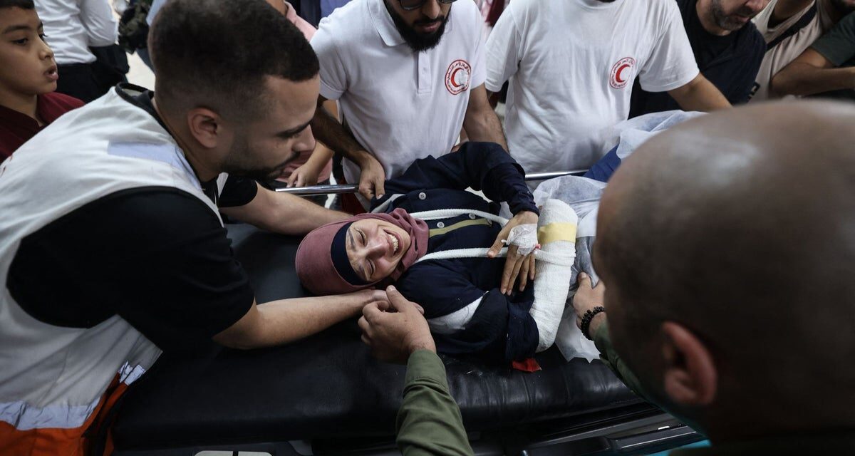 Reuters journalist among Palestinians injured after Israeli settlers attack olive harvesters in West Bank